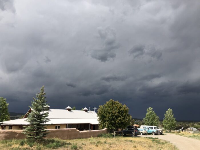 A house underneath a dark sky