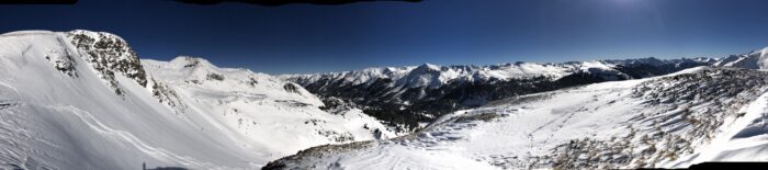A panoramic view of a snowy mountain range